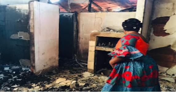 Tumasang counting losses, after her home was burned down (picture: Mboh Promise)